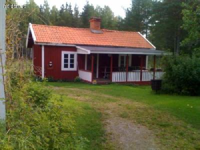 Mysig timmerstuga vid Orbaden.