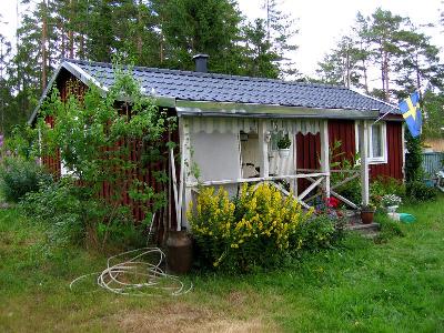 Mysig stuga nära havet