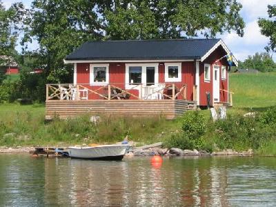 Sj�stuga med egen sandstrand