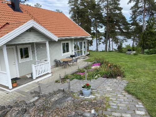 House with lake by Dalbystrand