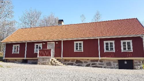 Hus vid sjön Raslången